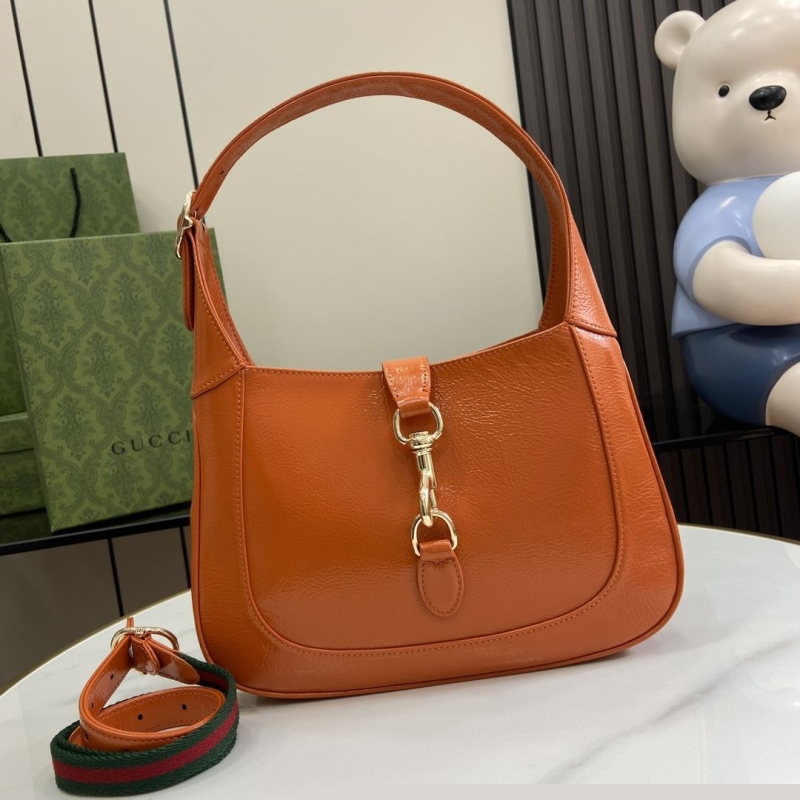 G*u*i top handle bags